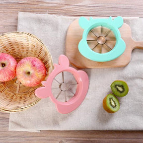 Apple cutting and coring tool with stainless steel blades for quick fruit slicing.