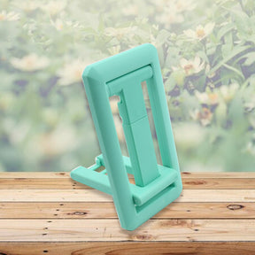 Mobile phone holder with adjustable height, foldable design